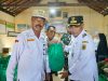 Pj Bupati Bersama Baznas Serahkan Bantuan untuk Korban Banjir dan Kebakaran