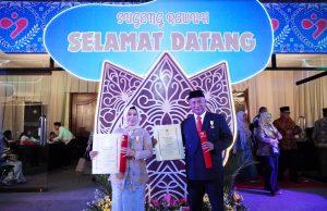 Harganas 2024, Pj Bupati Pati dan Istri Terima Anugerah Penghargaan Dharma Karya Kencana